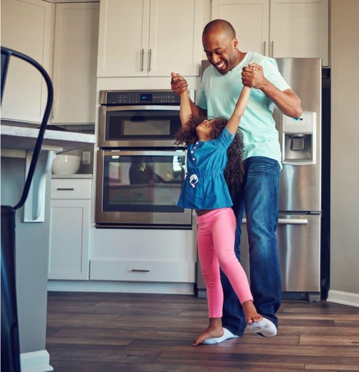 Home Warranty Membership Coverage - Father & Daughter in their Home